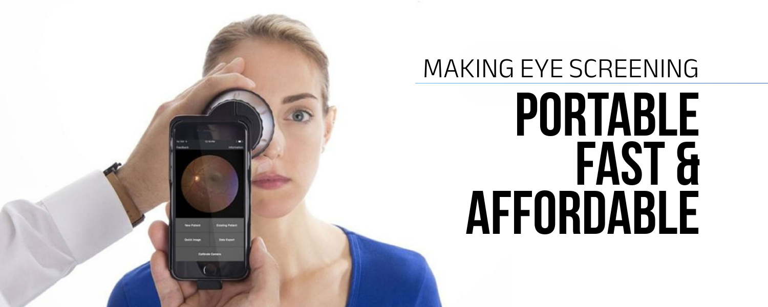 A doctor reviewing eye scan results on a smartphone